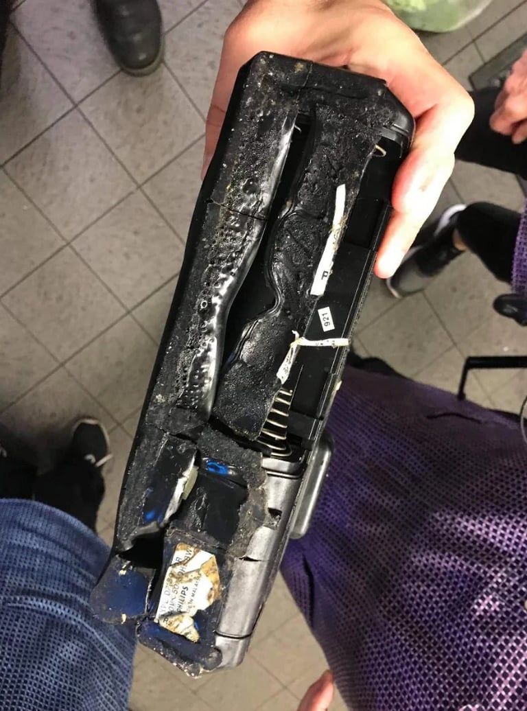 Photo of a badly damaged radio found in service within an aged care home, during routine testing and tagging