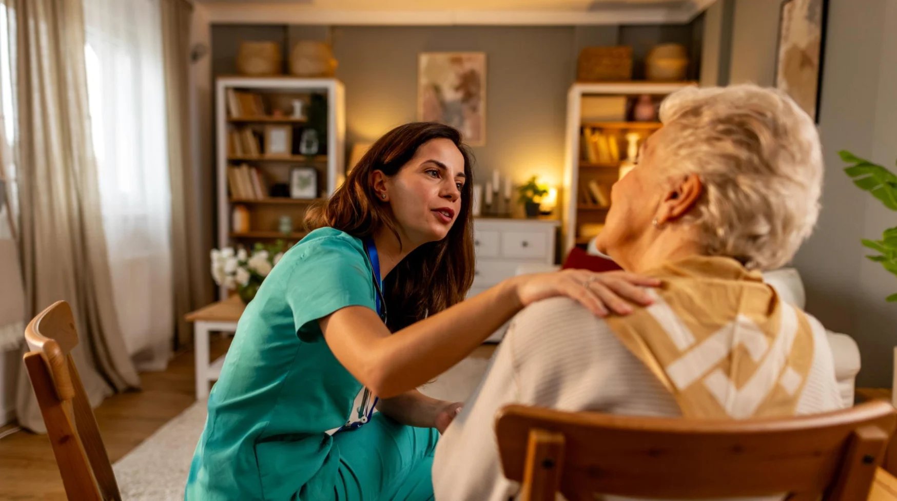 Aged care facility with healthcare workers assisting elderly residents in a comfortable environment
